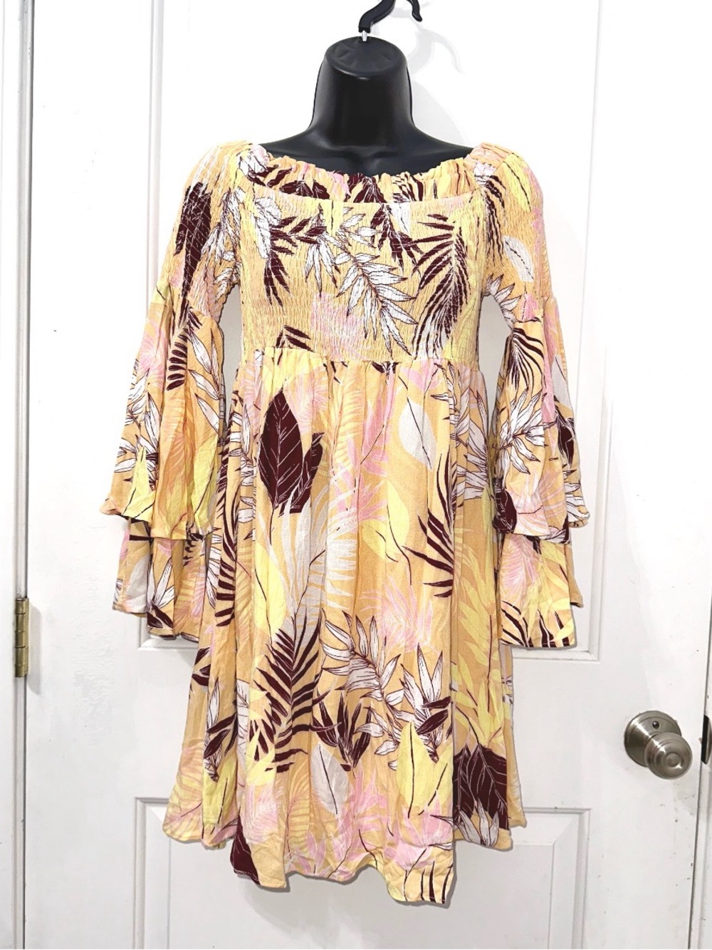 Cbrand off-the-shoulder top features a tropical floral print and flowy sleeves